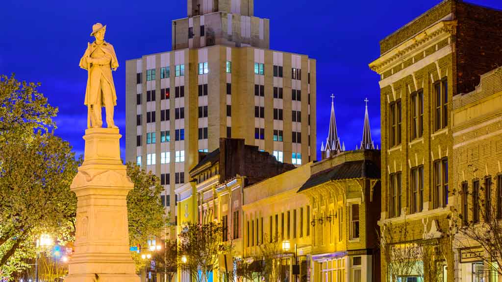 Cityscape of Macon, Georgia, showing a statue of a Confederate soldier dedicated in 1879