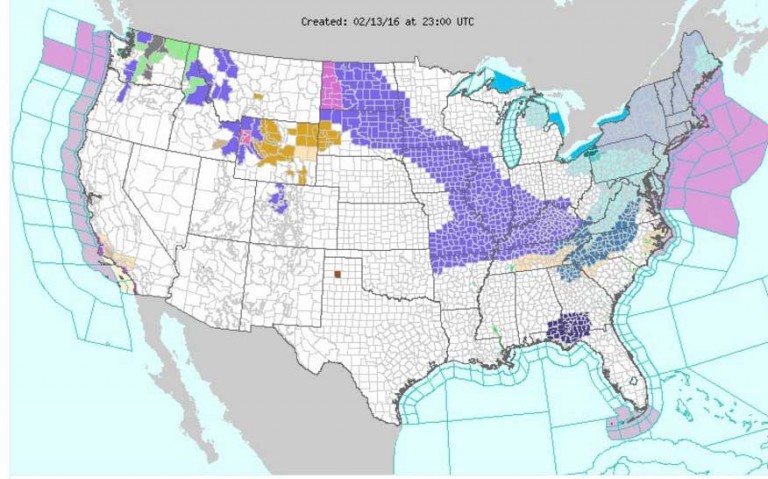 Chicago gets dry snow & a little wind on VDay
