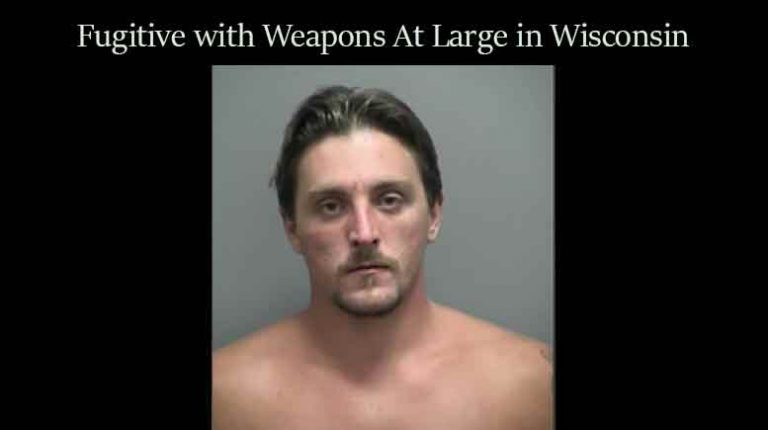 Dangerous fugitive at large & packing in Wis.