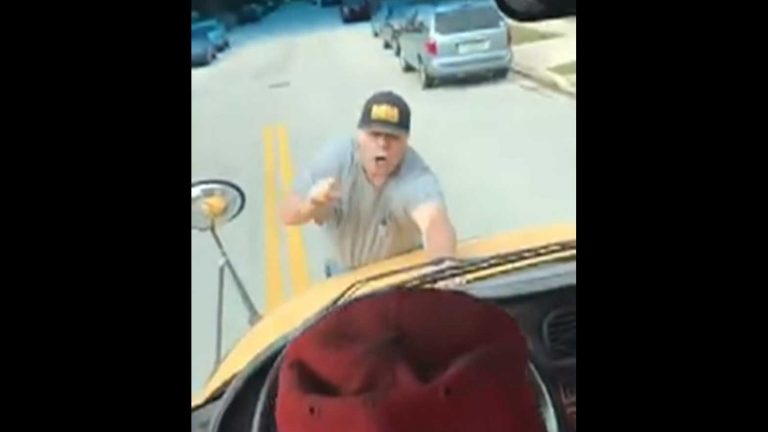 Man jumps on hood of a middle school bus