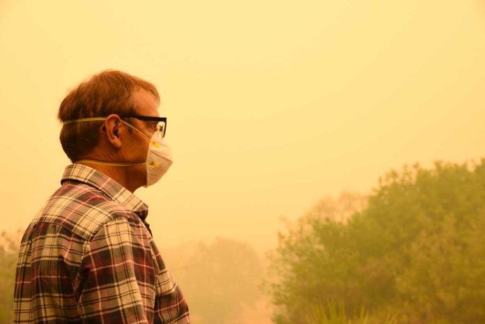 man-mask-smoke-pollution
